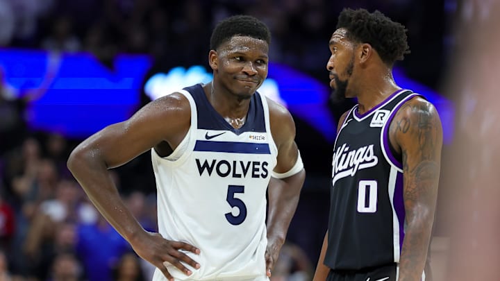 Oct 24, 2024; Sacramento, California, USA; Minnesota Timberwolves guard Anthony Edwards (5) talks with Sacramento Kings guard Malik Monk (0) during the fourth quarter at Golden 1 Center. Mandatory Credit: Sergio Estrada-Imagn Images