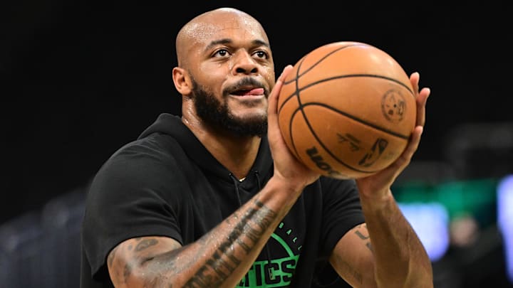 Dec 11, 2025; Milwaukee, Wisconsin, USA;  Boston Celtics center Xavier Tillman (26) warms up before the game against the Milwaukee Bucks at Fiserv Forum. Mandatory Credit: Benny Sieu-Imagn Images