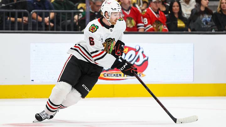 Sep 29, 2026; Las Vegas, Nevada, USA; Chicago Blackhawks defenseman Sam Rinzel (6) skates with the puck against the Vegas Golden Knights during the third period at T-Mobile Arena. Mandatory Credit: Christopher Trim-Imagn Images