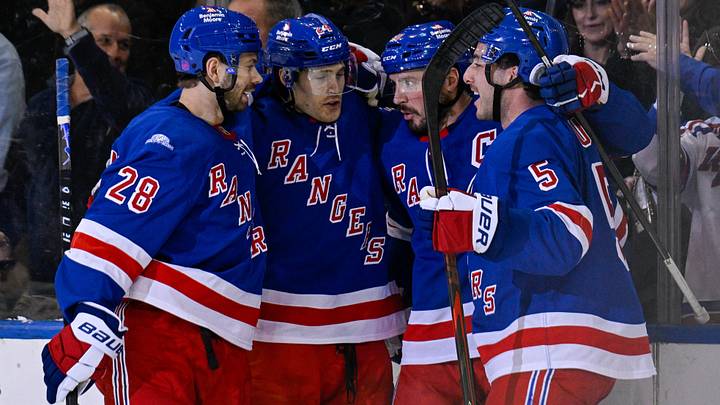 Oct 26, 2026; New York, New York, USA;  New York Rangers center J.T. Miller (10) celebrates his goal with New York Rangers defenseman Sean Durzi (5), New York Rangers right wing Oliver Bjorkstrand (28) and New York Rangers left wing Tye Kartye (24) against the Los Angeles Kings during the first period at Madison Square Garden.  Mandatory Credit: Dennis Schneidler-Imagn Images