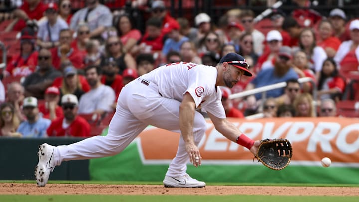 Sep 22, 2024; St. Louis, Missouri, USA; St. Louis Cardinals first baseman Paul Goldschmidt (46) fields a ground ball against the Cleveland Guardians during the sixth inning at Busch Stadium. Sep 22, 2024; St. Louis, Missouri, USA; St. Louis Cardinals first baseman Paul Goldschmidt (46) fields a ground ball against the Cleveland Guardians during the sixth inning at Busch Stadium.
