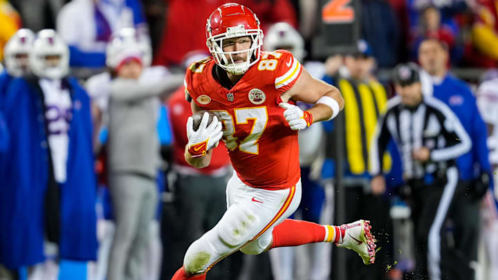 Dec 10, 2023; Kansas City, Missouri, USA; Kansas City Chiefs tight end Travis Kelce (87) runs with