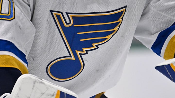 Dec 14, 2024; Dallas, Texas, USA; A view of the Blues logo on the jersey of St. Louis Blues goaltender Jordan Binnington (50) during the game between the Dallas Stars and the St. Louis Blues at American Airlines Center. Mandatory Credit: Jerome Miron-Imagn Images Dec 14, 2024; Dallas, Texas, USA; A view of the Blues logo on the jersey of St. Louis Blues goaltender Jordan Binnington (50) during the game between the Dallas Stars and the St. Louis Blues at American Airlines Center. Mandatory Credit: Jerome Miron-Imagn Images