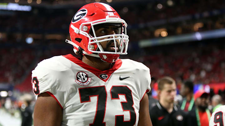Dec 2, 2023; Atlanta, GA, USA; Georgia Bulldogs offensive lineman Xavier Truss (73) before the SEC Championship game against the Alabama Crimson Tide at Mercedes-Benz Stadium. Mandatory Credit: Brett Davis-Imagn Images Dec 2, 2023; Atlanta, GA, USA; Georgia Bulldogs offensive lineman Xavier Truss (73) before the SEC Championship game against the Alabama Crimson Tide at Mercedes-Benz Stadium. Mandatory Credit: Brett Davis-Imagn Images