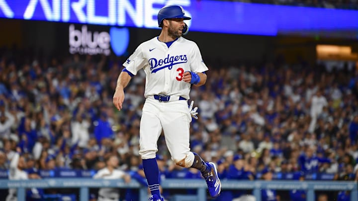 May 13, 2025; Los Angeles, California, USA; Los Angeles Dodgers outfielder Chris Taylor (3) scores a run in the third inning against the Oakland Athletics at Dodger Stadium. Mandatory Credit: Gary A. Vasquez-Imagn Images