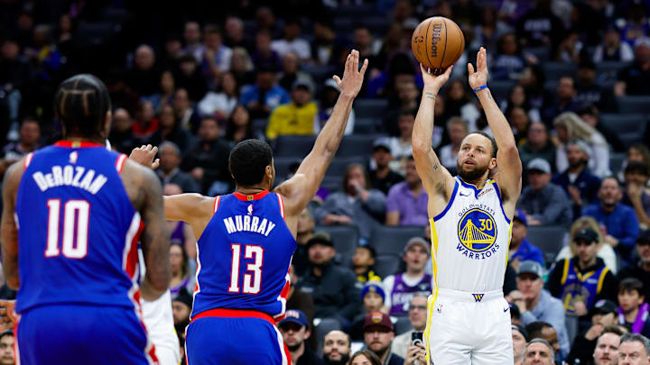 Feb 21, 2025; Sacramento, California, USA; Golden State Warriors guard Stephen Curry (30) shoots the ball against Sacramento Kings forward Keegan Murray (13) during the third fourth quarter at Golden 1 Center. Mandatory Credit: Sergio Estrada-Imagn Images Feb 21, 2025; Sacramento, California, USA; Golden State Warriors guard Stephen Curry (30) shoots the ball against Sacramento Kings forward Keegan Murray (13) during the third fourth quarter at Golden 1 Center. Mandatory Credit: Sergio Estrada-Imagn Images