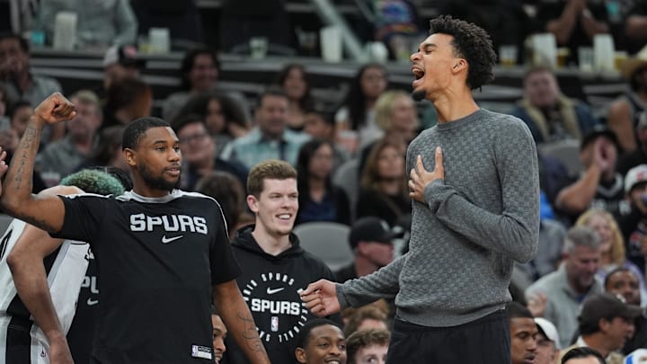 Mar 4, 2025; San Antonio, Texas, USA; San Antonio Spurs guard Blake Wesley (14) and San Antonio Spurs center Victor Wembanyama (1) celebrate on the sideline in the second half against the Brooklyn Nets at Frost Bank Center. Mar 4, 2025; San Antonio, Texas, USA; San Antonio Spurs guard Blake Wesley (14) and San Antonio Spurs center Victor Wembanyama (1) celebrate on the sideline in the second half against the Brooklyn Nets at Frost Bank Center.