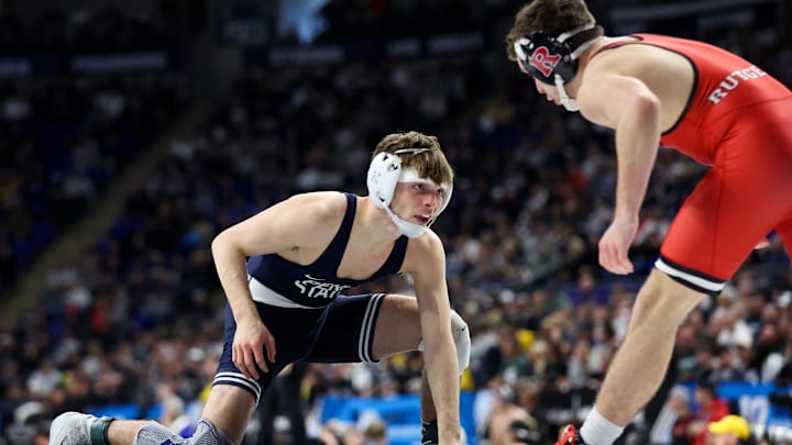 Penn State Nittany Lions wrestler Marcus Blaze (left) competes againsts Rutgers' Dylan Shawver at the Big Ten Wrestling Championships at Bryce Jordan Center.