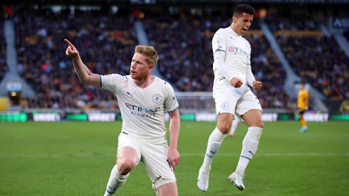 Kévin De Bruyne, à gauche, a marqué un quadruplé contre les Wolves mercredi.