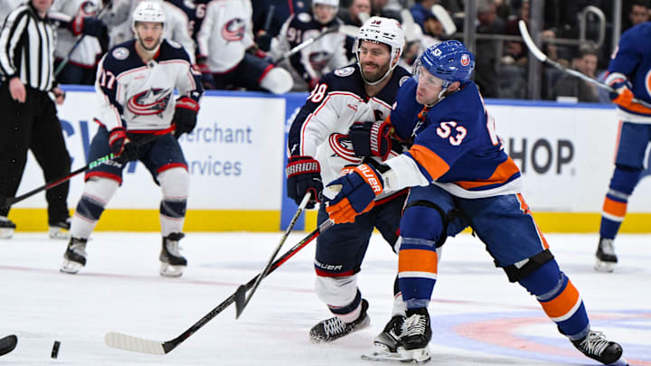 Dec 7, 2023; Elmont, New York, USA; New York Islanders center Casey Cizikas (53) tries to skate past