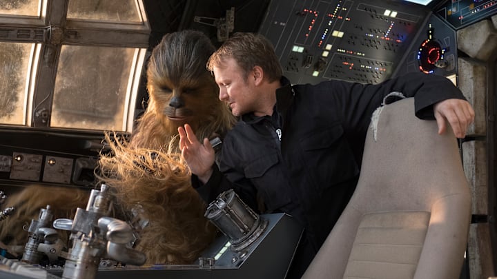 L to R: Chewbacca (Joonas Suotamo) and Director Rian Johnson on the set of Star Wars: The Last Jedi.