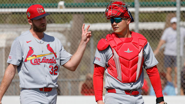 Feb 16, 2026; Jupiter, FL, USA;  St. Louis Cardinals pitcher Matthew Liberatore (32) walks with catcher Andy Yerzy (right) after a bullpen session during spring training workouts at Roger Dean Stadium. Mandatory Credit: Reinhold Matay-Imagn Images