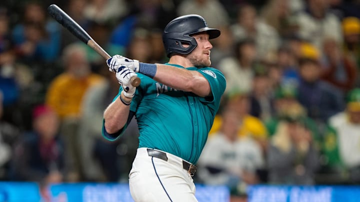 Seattle Mariners first baseman Luke Raley hits a two-run home run against the Oakland Athletics on Sept. 28 at T-Mobile Park.