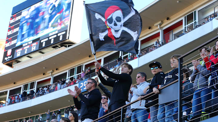Nov 9, 2024; Lubbock, Texas, USA; A young Texas Tech Red Raiders fan in the stands during the first half during the game against the Colorado Buffalos at Jones AT&T Stadium and Cody Campbell Field. Mandatory Credit: Michael C. Johnson-Imagn Images