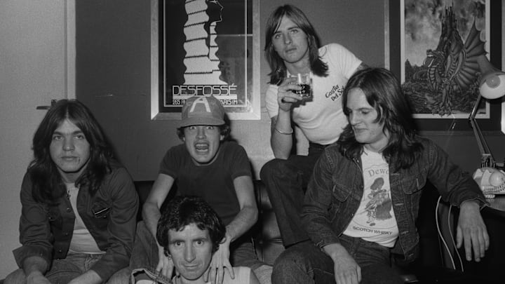 Phil Rudd, Bon Scott, Mark Evans, Angus Young, and Malcolm Young (AC/DC)