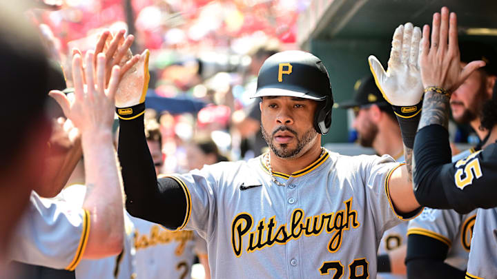 Aug 28, 2025; St. Louis, Missouri, USA; Pittsburgh Pirates left fielder Tommy Pham (28) high fives teammates in the dugout after hitting a solo home run against the St. Louis Cardinals during the first inning at Busch Stadium. Mandatory Credit: Tim Vizer-Imagn Images