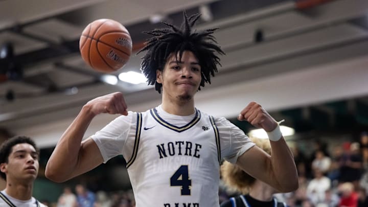 Jan 4, 2025; Gilbert, AZ, USA; Notre Dame High School (CA) forward Tyran Stokes (4) flexes as he celebrates a shot against Sandra Day O'Connor (AZ) during the Hoophall West High School Invitational at Highland High School.