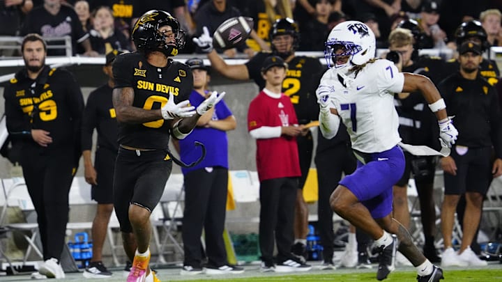 Arizona State wide receiver Jordyn Tyson (0) catches a pass against TCU defensive back Channing Canada (7) on his way to a touchdown during a game at Mountain America Stadium in Tempe, Ariz. on Sept. 26, 2025. Arizona State wide receiver Jordyn Tyson (0) catches a pass against TCU defensive back Channing Canada (7) on his way to a touchdown during a game at Mountain America Stadium in Tempe, Ariz. on Sept. 26, 2025.