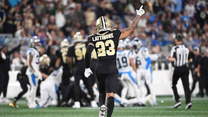 Sep 18, 2023; Charlotte, North Carolina, USA; New Orleans Saints cornerback Marshon Lattimore (23) signals a turnover by Carolina Panthers in the second quarter at Bank of America Stadium. Mandatory Credit: Bob Donnan-Imagn Images Sep 18, 2023; Charlotte, North Carolina, USA; New Orleans Saints cornerback Marshon Lattimore (23) signals a turnover by Carolina Panthers in the second quarter at Bank of America Stadium. Mandatory Credit: Bob Donnan-Imagn Images