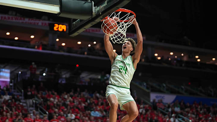 Storm Lake junior Jaidyn Coon dunks the basketball against ADM during the Iowa high school boys state basketball tournament on Monday, March 10, 2025, at Wells Fargo Arena in Des Moines. Mandatory Credit: Bryon Houlgrave-The Des Moines Register