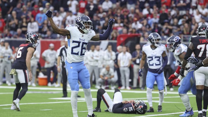Nov 24, 2024; Houston, Texas, USA; Tennessee Titans cornerback Justin Hardee Sr. (26) reacts after Houston Texans place kicker Ka'imi Fairbairn (15) misses a field goal during the fourth quarter at NRG Stadium. Mandatory Credit: Troy Taormina-Imagn Images