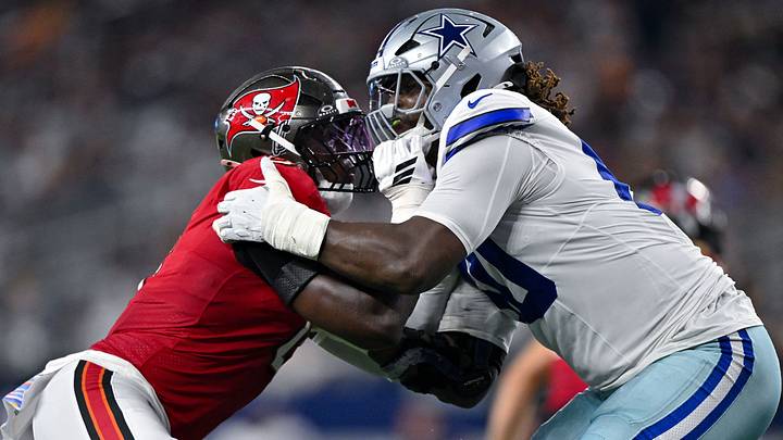 Tampa Bay Buccaneers linebacker Yaya Diaby rushes the line against Dallas Cowboys offensive tackle Tyler Guyton. Tampa Bay Buccaneers linebacker Yaya Diaby rushes the line against Dallas Cowboys offensive tackle Tyler Guyton.