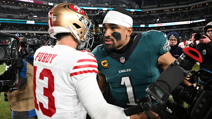 Jan 11, 2026; Philadelphia, PA, USA; San Francisco 49ers quarterback Brock Purdy (13) speaks with Philadelphia Eagles quarterback Jalen Hurts (1) after an NFC Wild Card Round game at Lincoln Financial Field. Mandatory Credit: Eric Hartline-Imagn Images