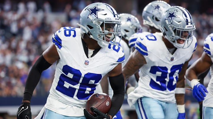Dallas Cowboys CB DaRon Bland celebrates with teammates after returning an interception for a touchdown against the New England Patriots 
