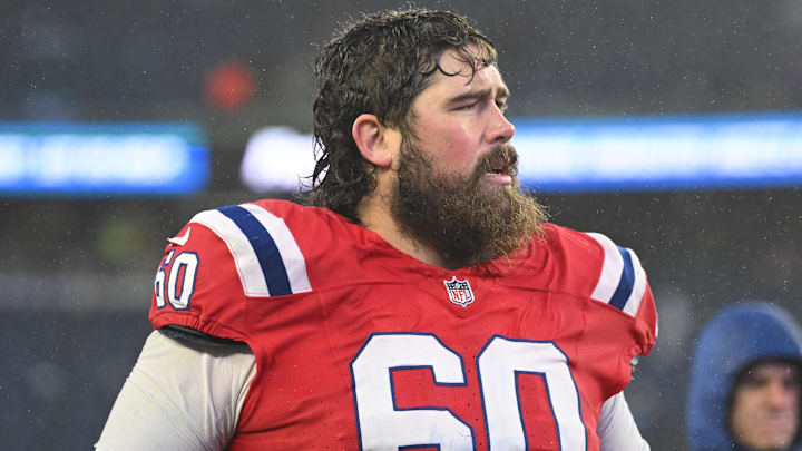 Dec 3, 2023; Foxborough, Massachusetts, USA; New England Patriots center David Andrews (60) walks off of the field after a game against the Los Angeles Chargers at Gillette Stadium. Mandatory Credit: Brian Fluharty-Imagn Images