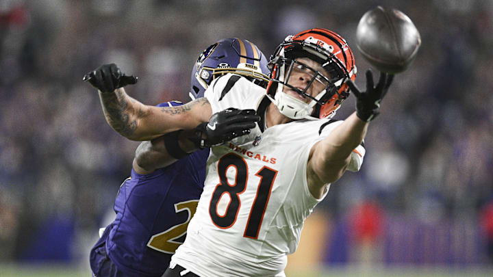 Nov 7, 2024; Baltimore, Maryland, USA; Cincinnati Bengals wide receiver Jermaine Burton (81) reaches for quarterback Joe Burrow (not pictured) throws ass Baltimore Ravens cornerback Brandon Stephens (21) defends during the second half   at M&T Bank Stadium. 