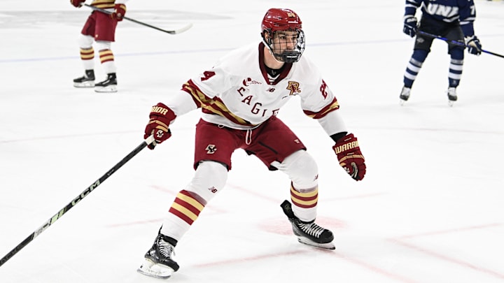 Feb 28, 2025; Chestnut Hill, MA, USA; Boston College forward Andre Gasseau (24) skates against the University of New Hampshire Wildcats during the first period at Conte Forum. Mandatory Credit: Eric Canha-Imagn Images