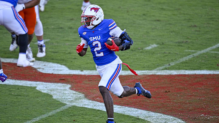 Oct 4, 2025; Dallas, Texas, USA; SMU Mustangs wide receiver Jordan Hudson (2) runs with the ball during the second half against the Syracuse Orange at Gerald J. Ford Stadium. Mandatory Credit: Jerome Miron-Imagn Images