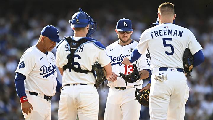 Jun 1, 2025; Los Angeles, California, USA; Los Angeles Dodgers third baseman Max Muncy (13), manager Dave Roberts (30), catcher Will Smith (16), and first baseman Freddie Freeman (5) meet at the mount against the New York Yankees during the fifth inning at Dodger Stadium. Mandatory Credit: Jonathan Hui-Imagn Images Jun 1, 2025; Los Angeles, California, USA; Los Angeles Dodgers third baseman Max Muncy (13), manager Dave Roberts (30), catcher Will Smith (16), and first baseman Freddie Freeman (5) meet at the mount against the New York Yankees during the fifth inning at Dodger Stadium. Mandatory Credit: Jonathan Hui-Imagn Images