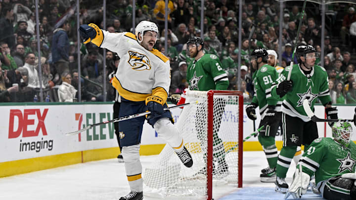 Jan 6, 2024; Dallas, Texas, USA; Nashville Predators left wing Filip Forsberg (9) celebrates after he scores a goal against Dallas Stars goaltender Scott Wedgewood (41) during the third period at the American Airlines Center. Mandatory Credit: Jerome Miron-USA TODAY Sports