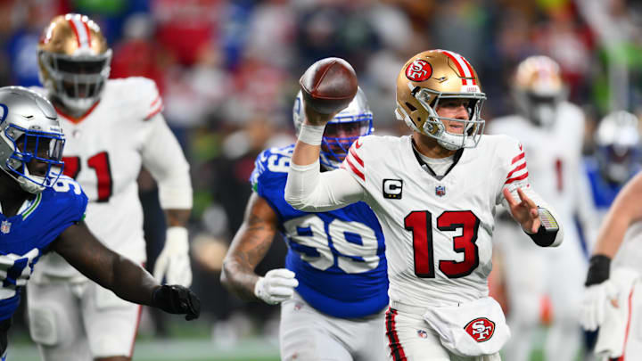 Oct 10, 2024; Seattle, Washington, USA; San Francisco 49ers quarterback Brock Purdy (13) passes the ball against the Seattle Seahawks during the second half at Lumen Field. Mandatory Credit: Steven Bisig-Imagn Images Oct 10, 2024; Seattle, Washington, USA; San Francisco 49ers quarterback Brock Purdy (13) passes the ball against the Seattle Seahawks during the second half at Lumen Field. Mandatory Credit: Steven Bisig-Imagn Images