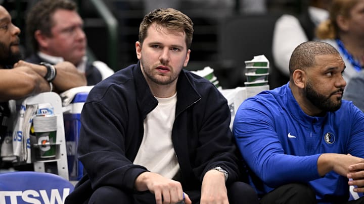 Dallas Mavericks guard Doncic reacts from the team bench during the second half of the game against the Denver Nuggets at the American Airlines Center. 
