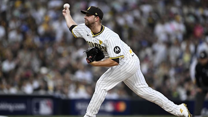 Oct 8, 2024; San Diego, California, USA; San Diego Padres pitcher Michael King (34) throws in the first inning during game three of the NLDS for the 2024 MLB Playoffs against the Los Angeles Dodgers at Petco Park.  