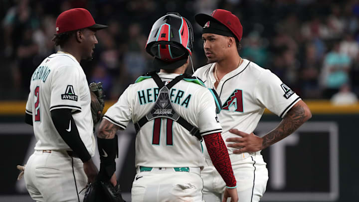Jun 9, 2025; Phoenix, Arizona, USA; Arizona Diamondbacks pitcher Justin Martinez (63) leaves the game after an injury against the Seattle Mariners in the ninth inning at Chase Field. Mandatory Credit: Rick Scuteri-Imagn Images Jun 9, 2025; Phoenix, Arizona, USA; Arizona Diamondbacks pitcher Justin Martinez (63) leaves the game after an injury against the Seattle Mariners in the ninth inning at Chase Field. Mandatory Credit: Rick Scuteri-Imagn Images