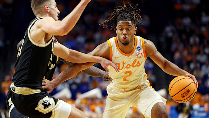 Mar 20, 2025; Lexington, KY, USA; Tennessee Volunteers guard Chaz Lanier (2) drives to the basket against Wofford Terriers forward Jeremy Lorenz (32) during the first half in the first round of the NCAA Tournament at Rupp Arena. Mandatory Credit: Jordan Prather-Imagn Images