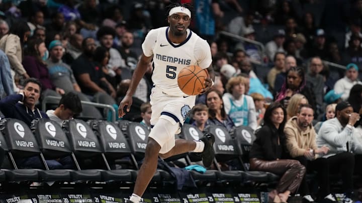 Feb 10, 2024; Charlotte, North Carolina, USA; Memphis Grizzlies guard Vince Williams Jr. (5) brings