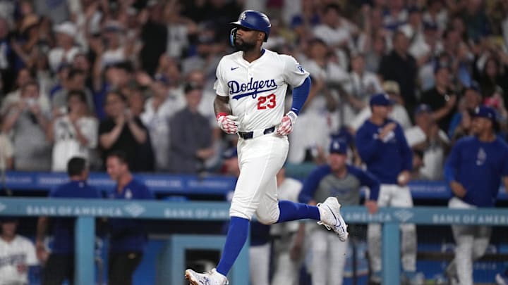 Aug 20, 2024; Los Angeles, California, USA; Los Angeles Dodgers right fielder Jason Heyward (23) runs the bases after hitting a three-run home run in the eighth inning against the Seattle Mariners at Dodger Stadium. Mandatory Credit: Kirby Lee-Imagn Images