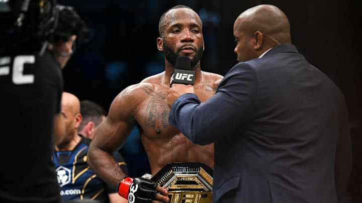 Mar 18, 2023; London, UNITED KINGDOM; Leon Edwards (red gloves) speaks after defeating Kamaru Usman