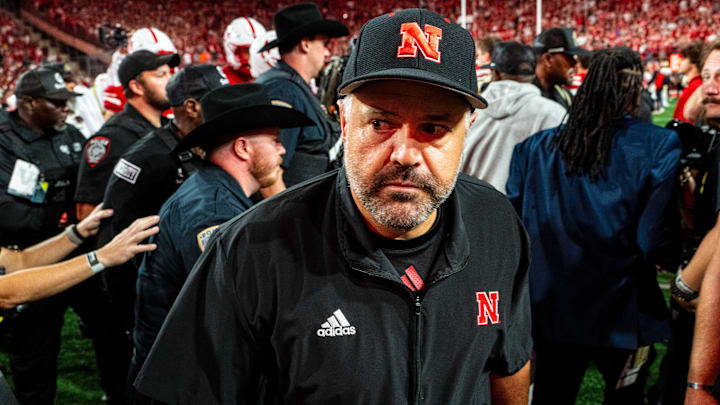 Sep 7, 2024; Lincoln, Nebraska, USA; Nebraska Cornhuskers head coach Matt Rhule walks off the field after defeating the Colorado Buffaloes at Memorial Stadium. Mandatory Credit: Dylan Widger-Imagn Images