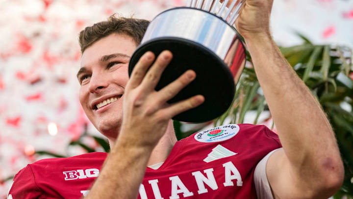 Indiana Hoosiers quarterback Fernando Mendoza (15) holds up the trophy Thursday, Jan. 1, 2026, after winning the 112th annual Rose Bowl game in Pasadena. Indiana Hoosiers defeated Alabama Crimson Tide, 38-3. Indiana Hoosiers quarterback Fernando Mendoza (15) holds up the trophy Thursday, Jan. 1, 2026, after winning the 112th annual Rose Bowl game in Pasadena. Indiana Hoosiers defeated Alabama Crimson Tide, 38-3.