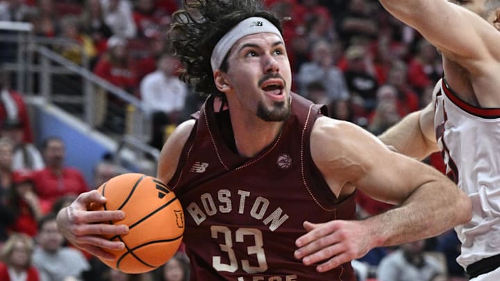 Boston College Eagles center Boden Kapke drives to the basket against Louisville Cardinals forward Vangelis Zougris during the first half at KFC Yum! Center.