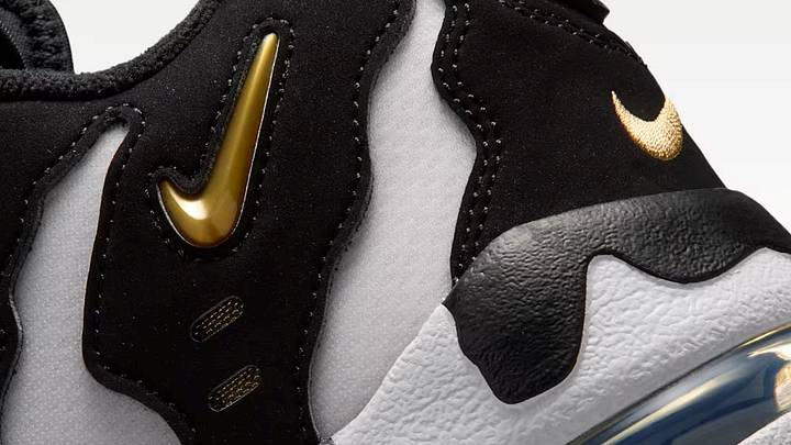 The Nike Air DT Max '96 Low "Black Metallic Gold" colorway. The Nike Air DT Max '96 Low "Black Metallic Gold" colorway.