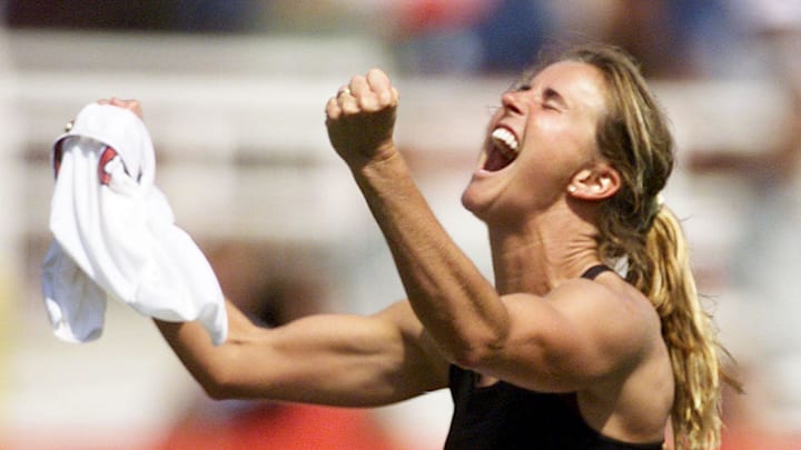 Brandi Chastain of the US celebrates after kicking Brandi Chastain of the US celebrates after kicking