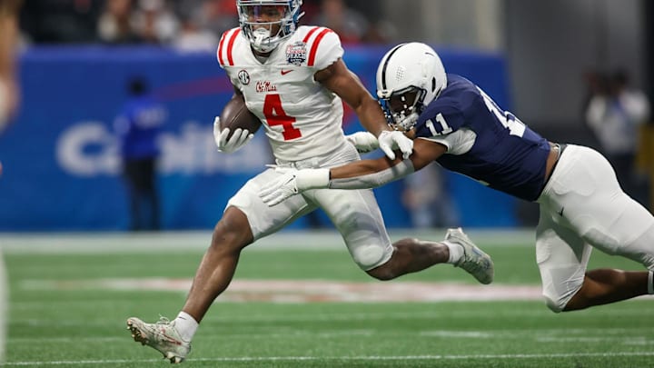 Mississippi Rebels running back Quinshon Judkins (4) is tackled by Abdul Carter (11)