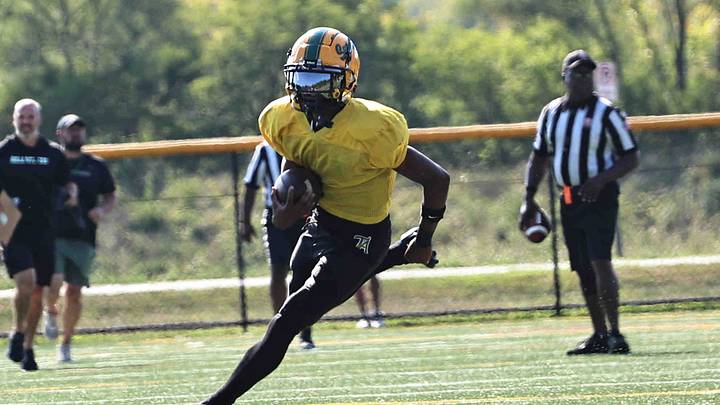 Taft quarterback Monsanna Torbert (1) runs the ball during their scrimmage against Anderson Friday, Aug. 9, 2024.