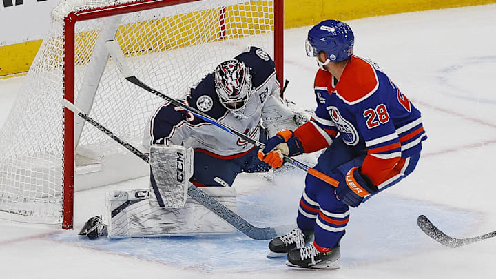 Edmonton forward Jack Roslovic scores the overtime game winner on Blue Jackets goaltender Jet Greaves.